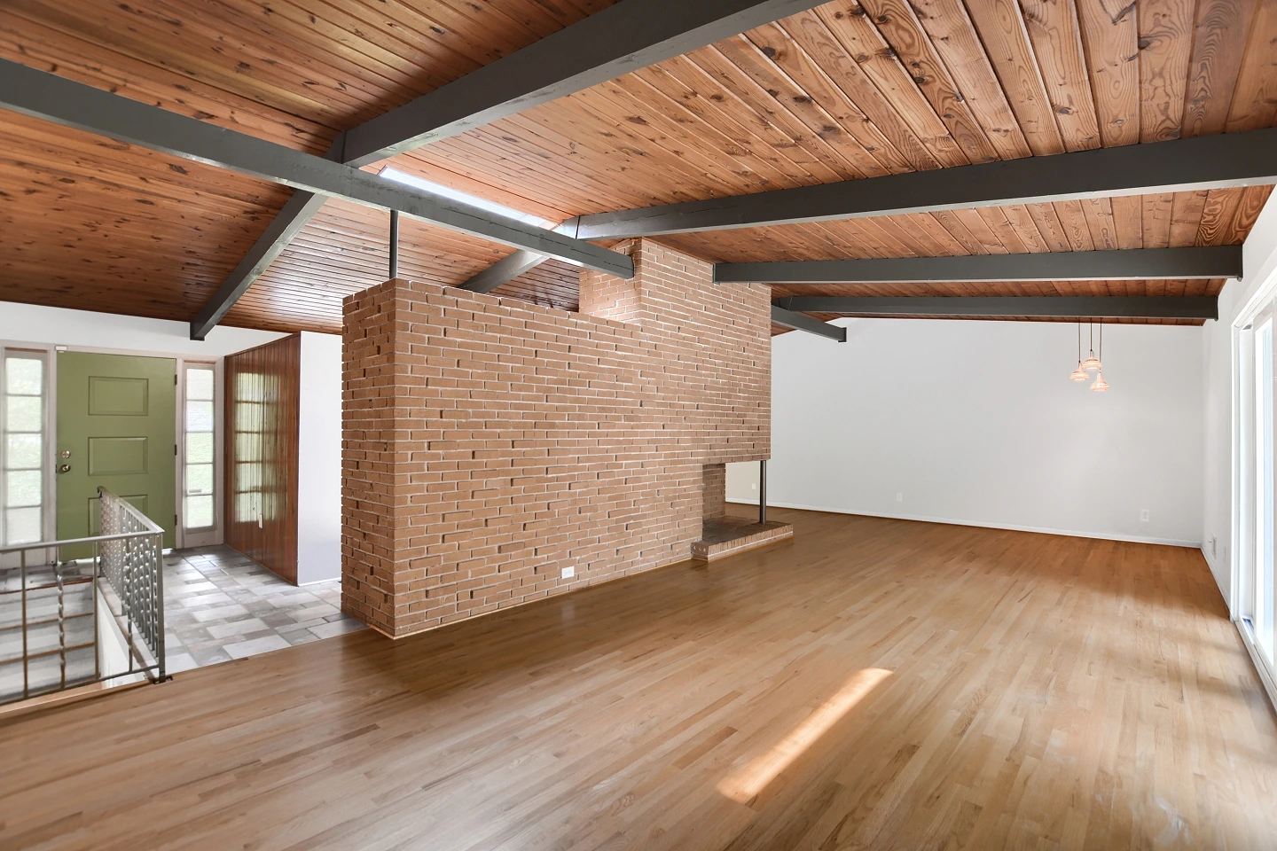 Wide shot of the same industrial-style room, excellent for unique property listings.